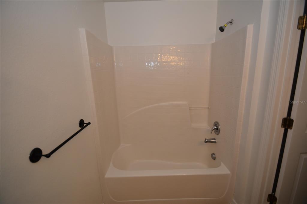 5 Kathleen Trail Palm Coast, FL 32164 - Photo 37 of 38 a bathroom with a shower