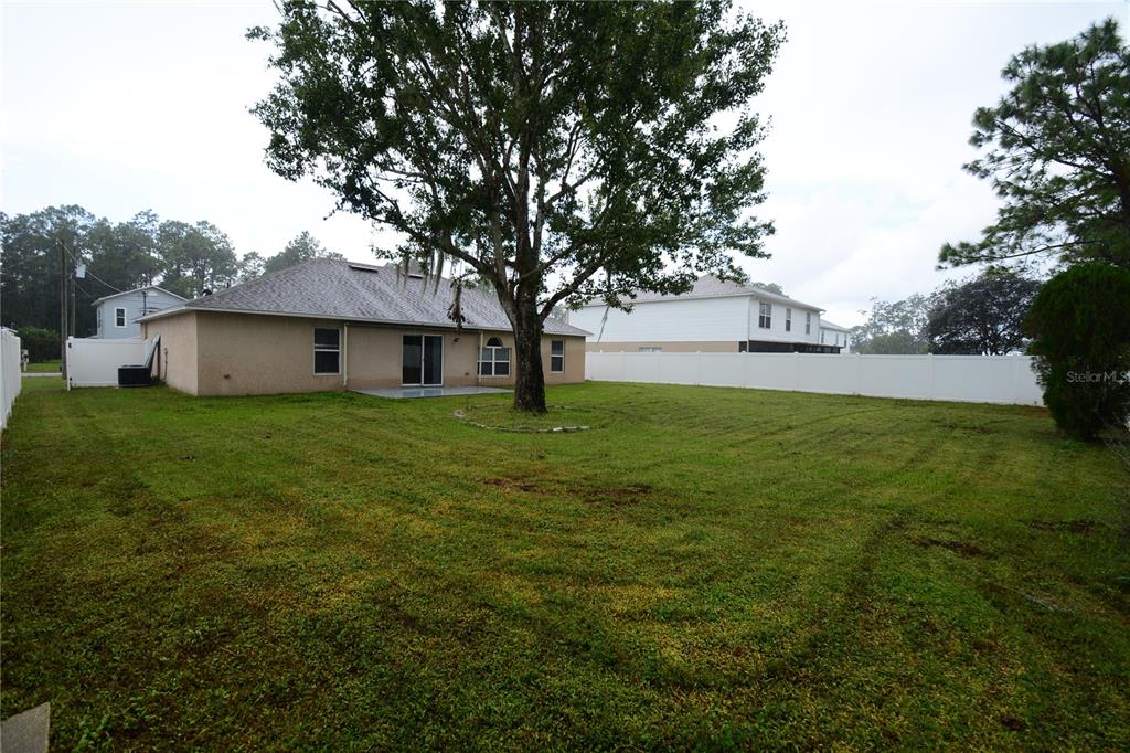 5 Kathleen Trail Palm Coast, FL 32164 - Photo 38 of 38 a view of a house with a big yard