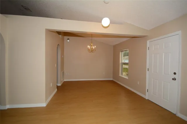 a view of an empty room and window