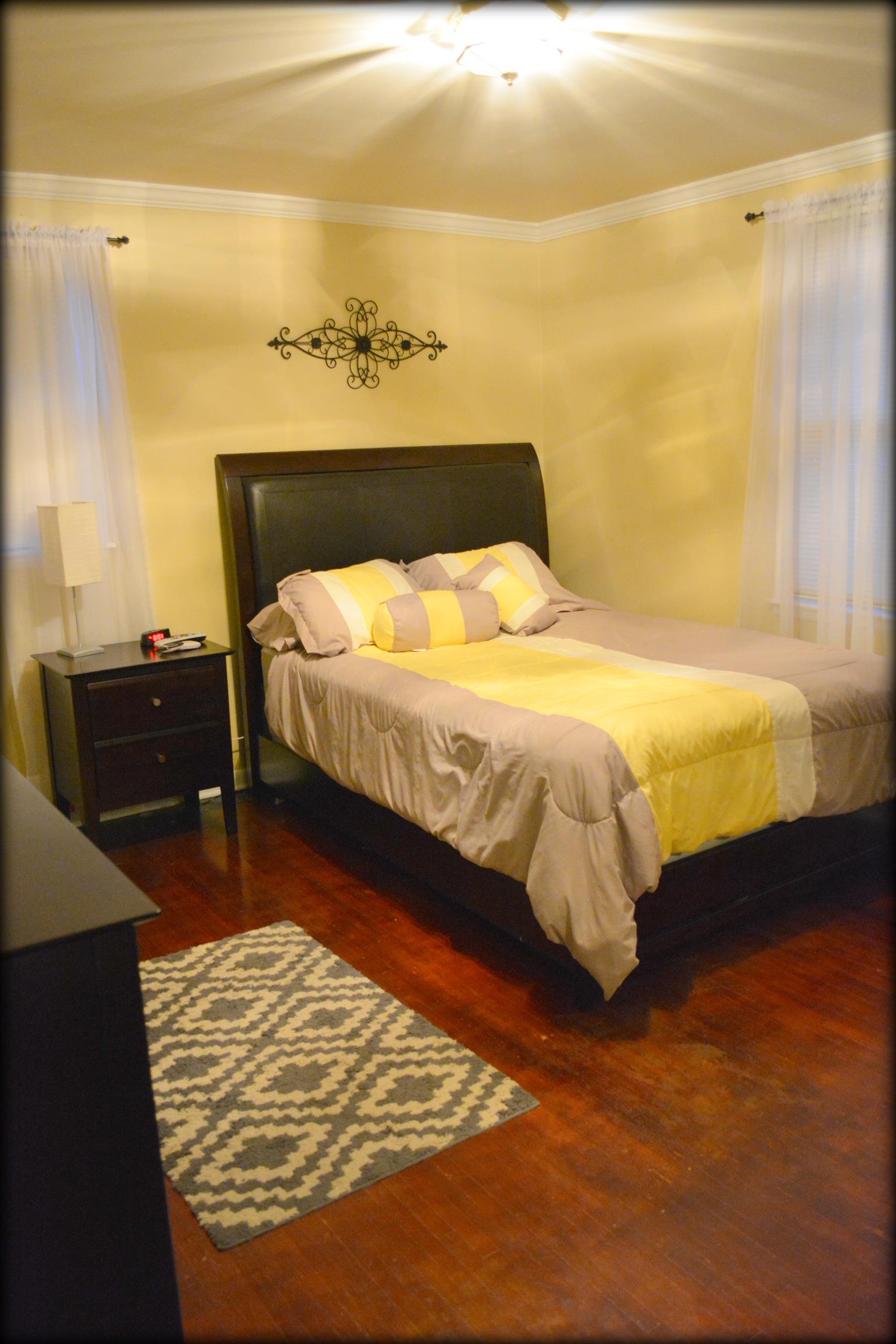 2656 Cairo Bend Road Lebanon, TN 37087 - Photo 10 of 18 a bed sitting in a bedroom next to a bathroom