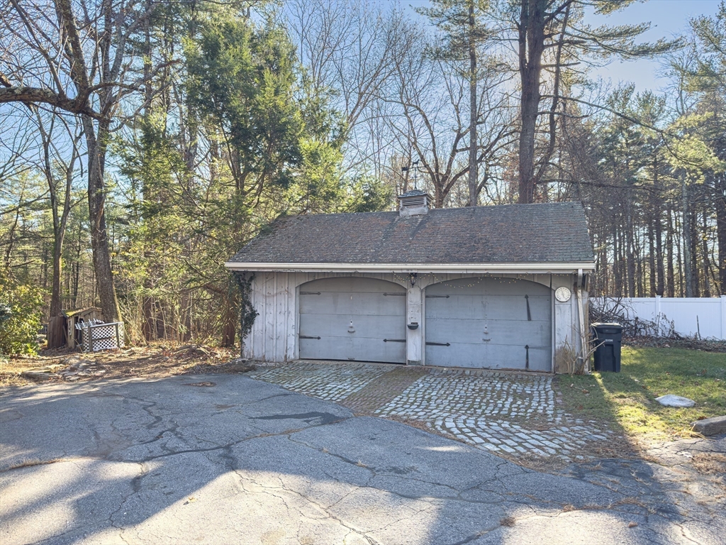 130 S Road Holden, MA 01520 - Photo 27 of 28 a view of a house with a yard and large tree