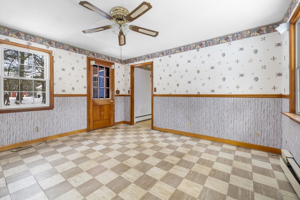 130 S Road Holden, MA 01520 - Photo 3 of 28 a view of a livingroom with wooden floor and a ceiling fan