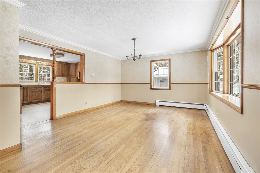 130 S Road Holden, MA 01520 - Photo 7 of 28 an empty room with wooden floor and windows