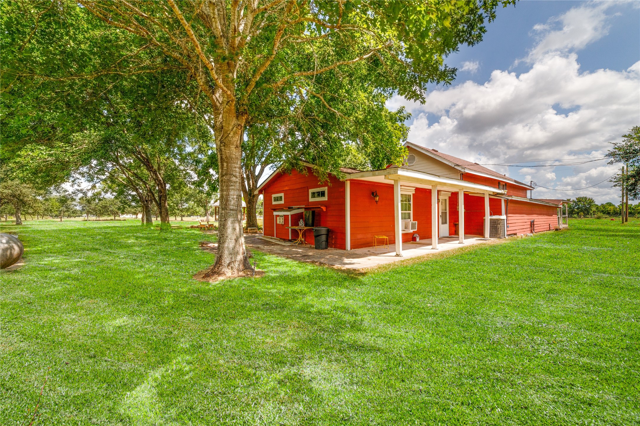 13025 Battle Road Beasley, TX 77417 - Photo 3 of 11 a view of a house with a backyard