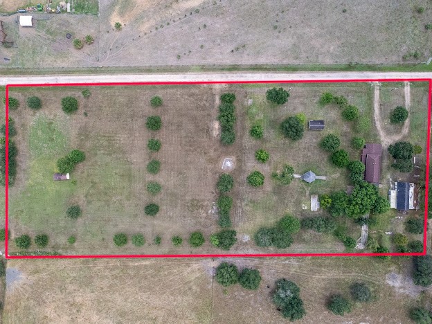 13025 Battle Road Beasley, TX 77417 - Photo 8 of 11 a small pool with red trees in front of it