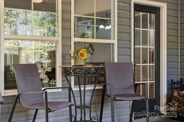 a dining room with furniture and windows