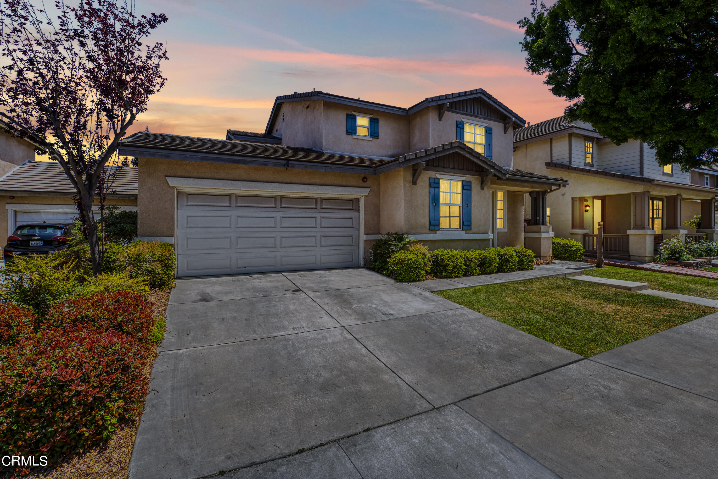 1320 Ribera Place Oxnard, CA 93030 - Photo 3 of 3 a front view of a house with garden