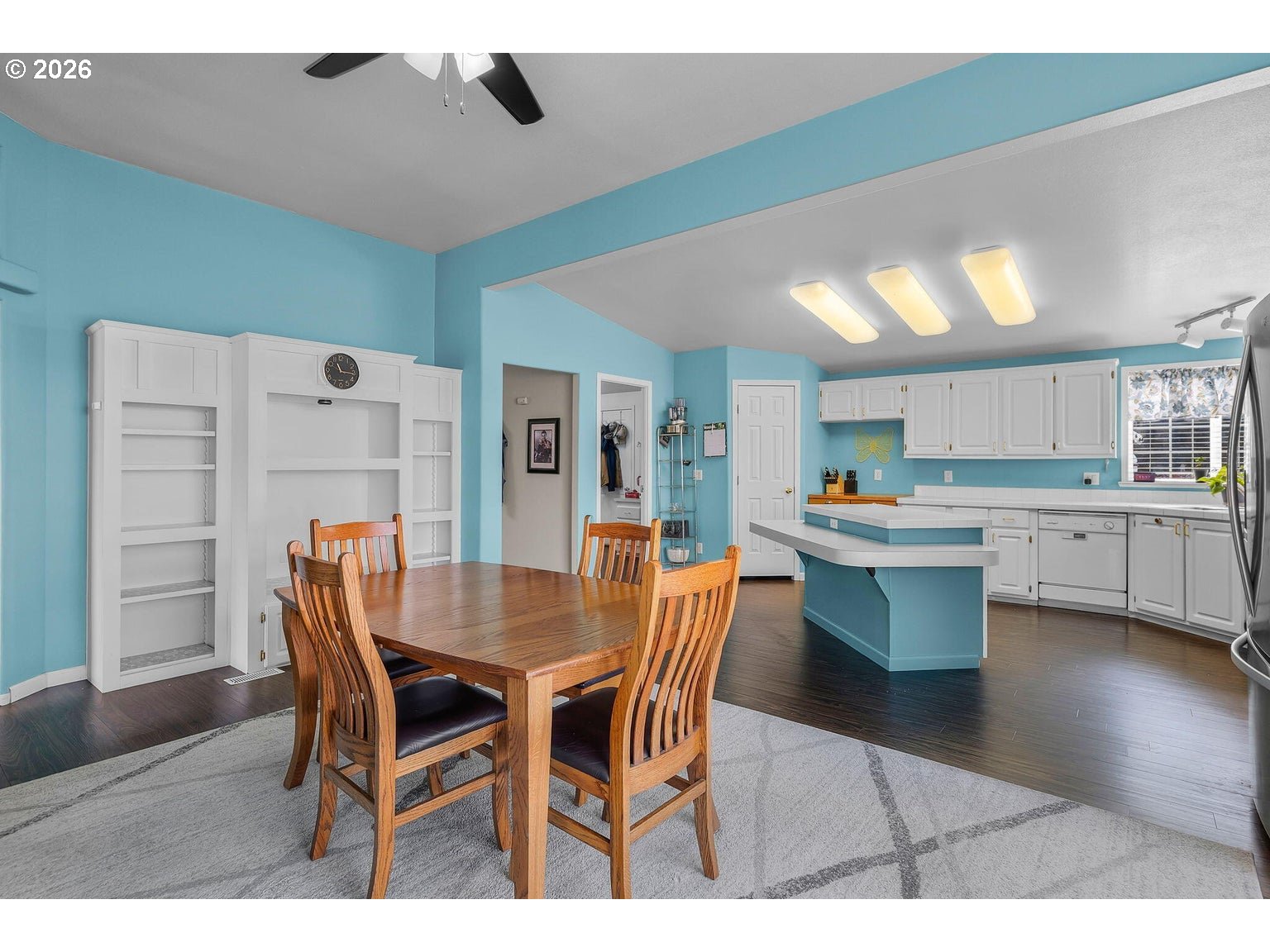 6983 Mustang Road Terrebonne, OR 97760 - Photo 13 of 36 a dining room with a table chairs and a kitchen view