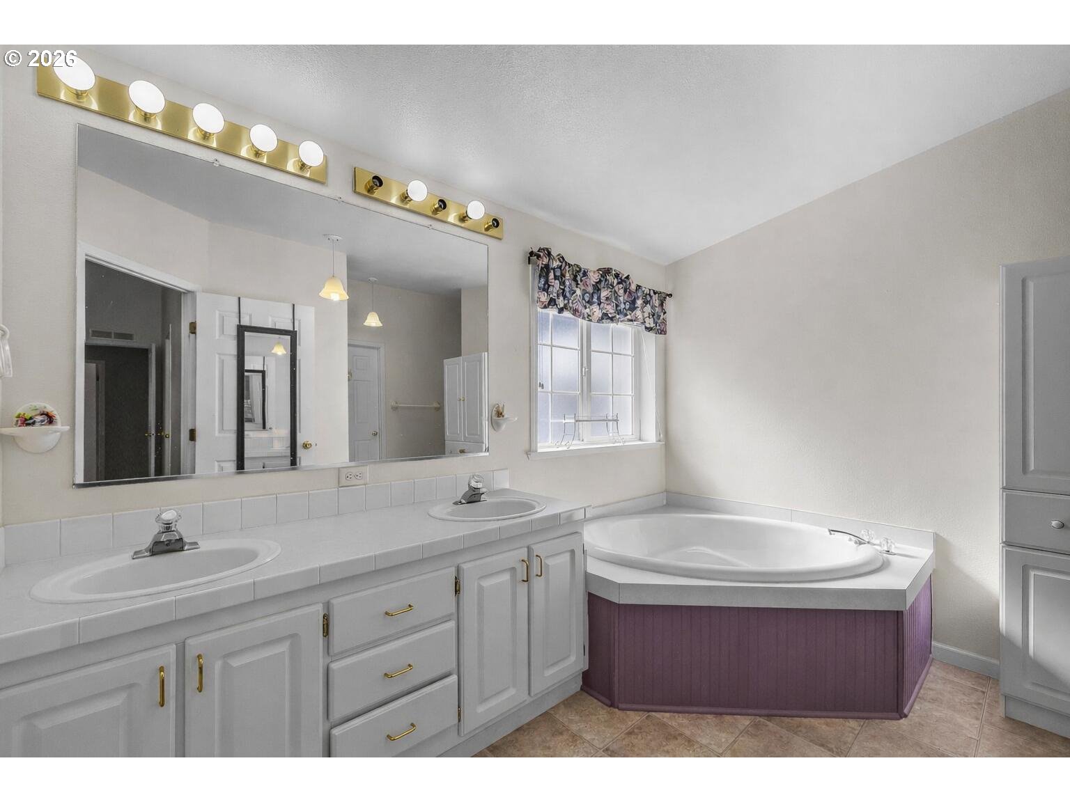6983 Mustang Road Terrebonne, OR 97760 - Photo 17 of 36 a bathroom with a sink and a mirror