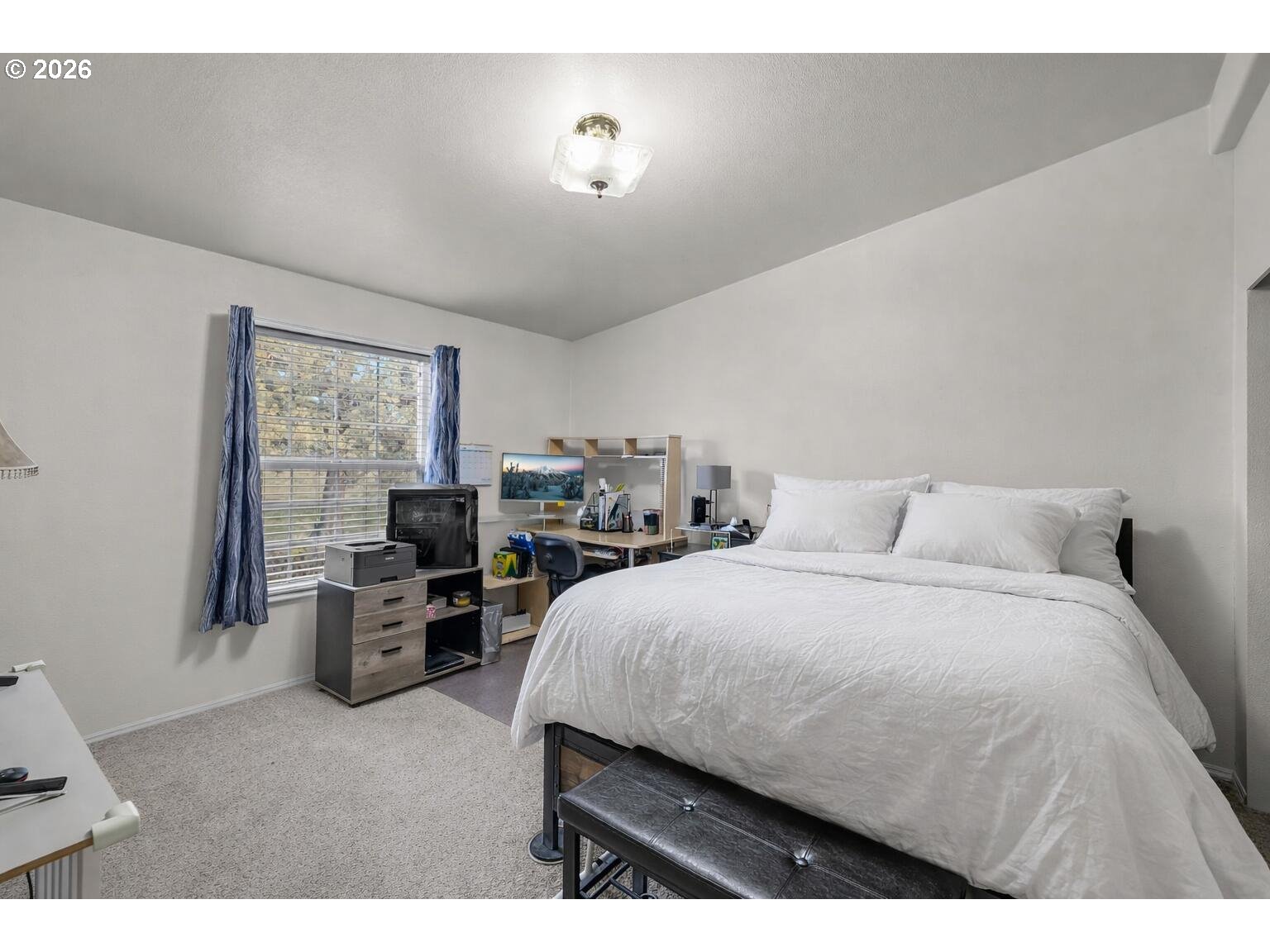 6983 Mustang Road Terrebonne, OR 97760 - Photo 18 of 36 a spacious bedroom with a bed and furniture