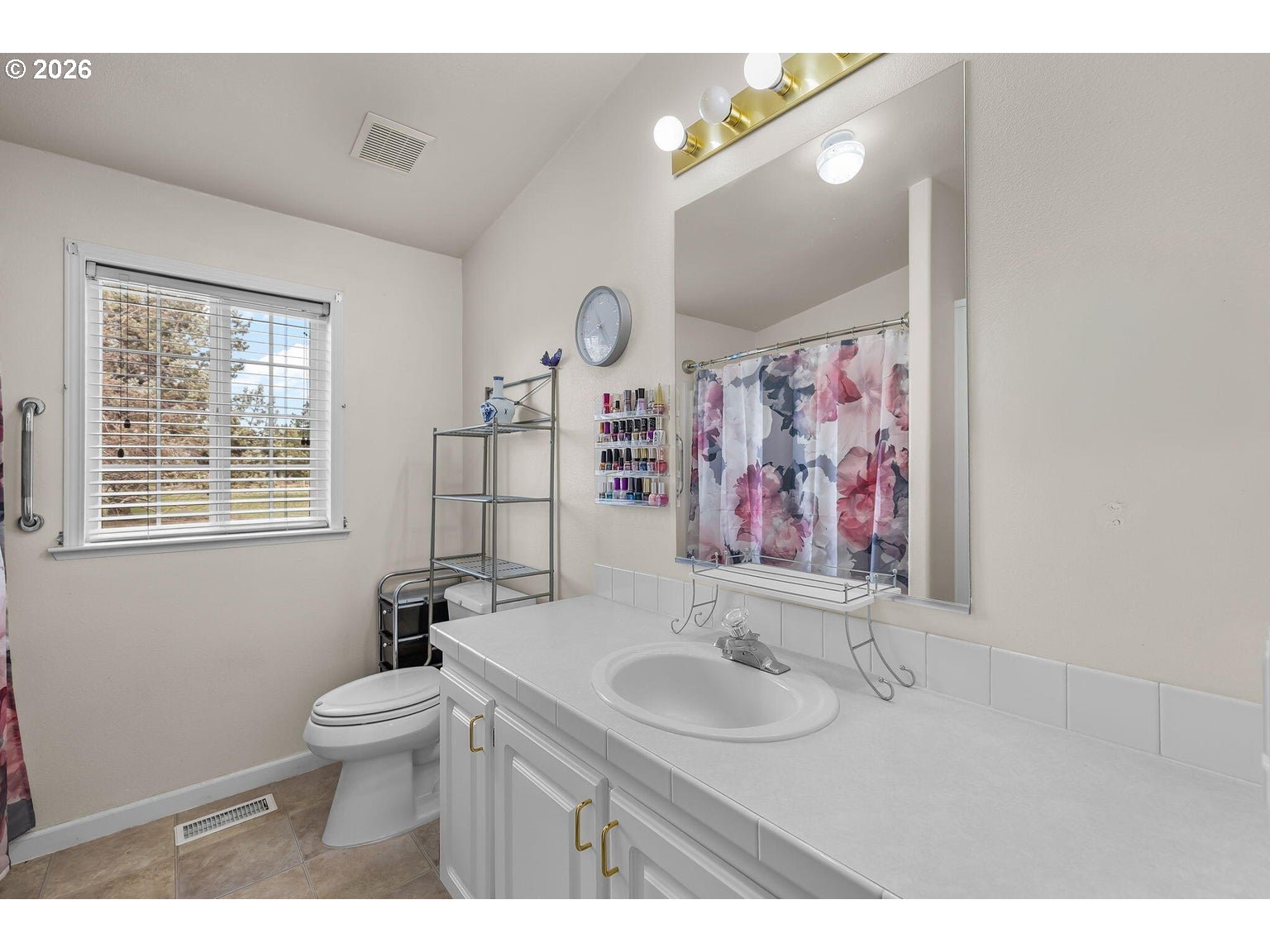 6983 Mustang Road Terrebonne, OR 97760 - Photo 19 of 36 a bathroom with a sink a toilet and a mirror