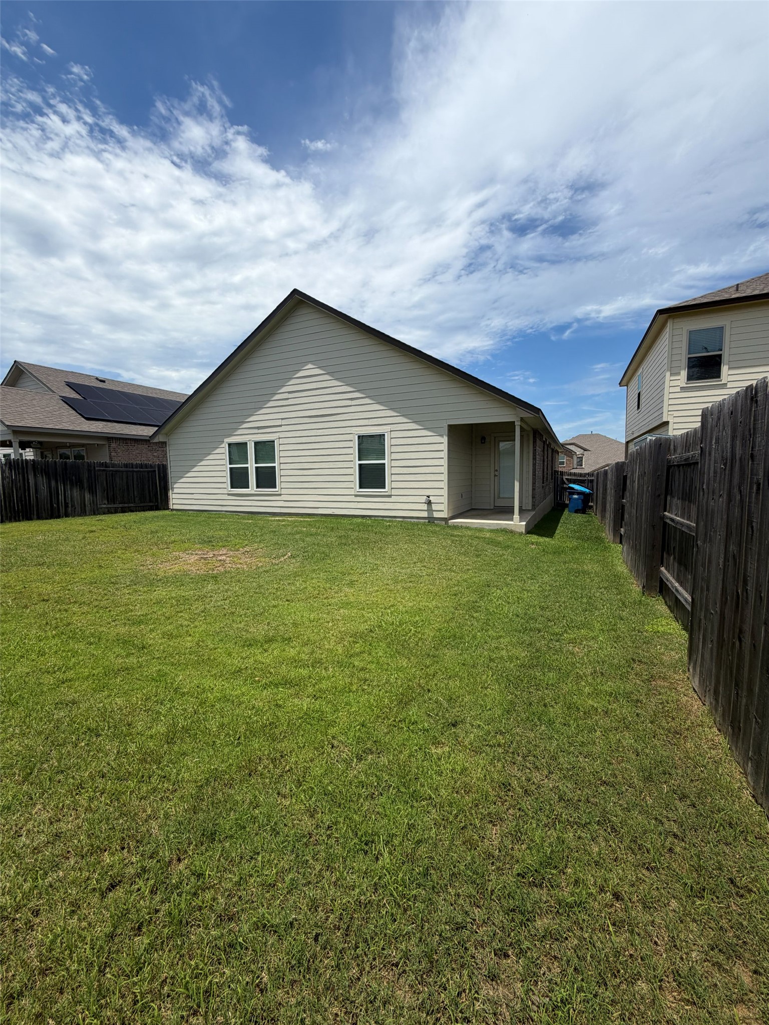 248 Falling Star Lane Georgetown, TX 78628 - Photo 15 of 16 A generously sized yard provides ample space for recreation and outdoor enjoyment.