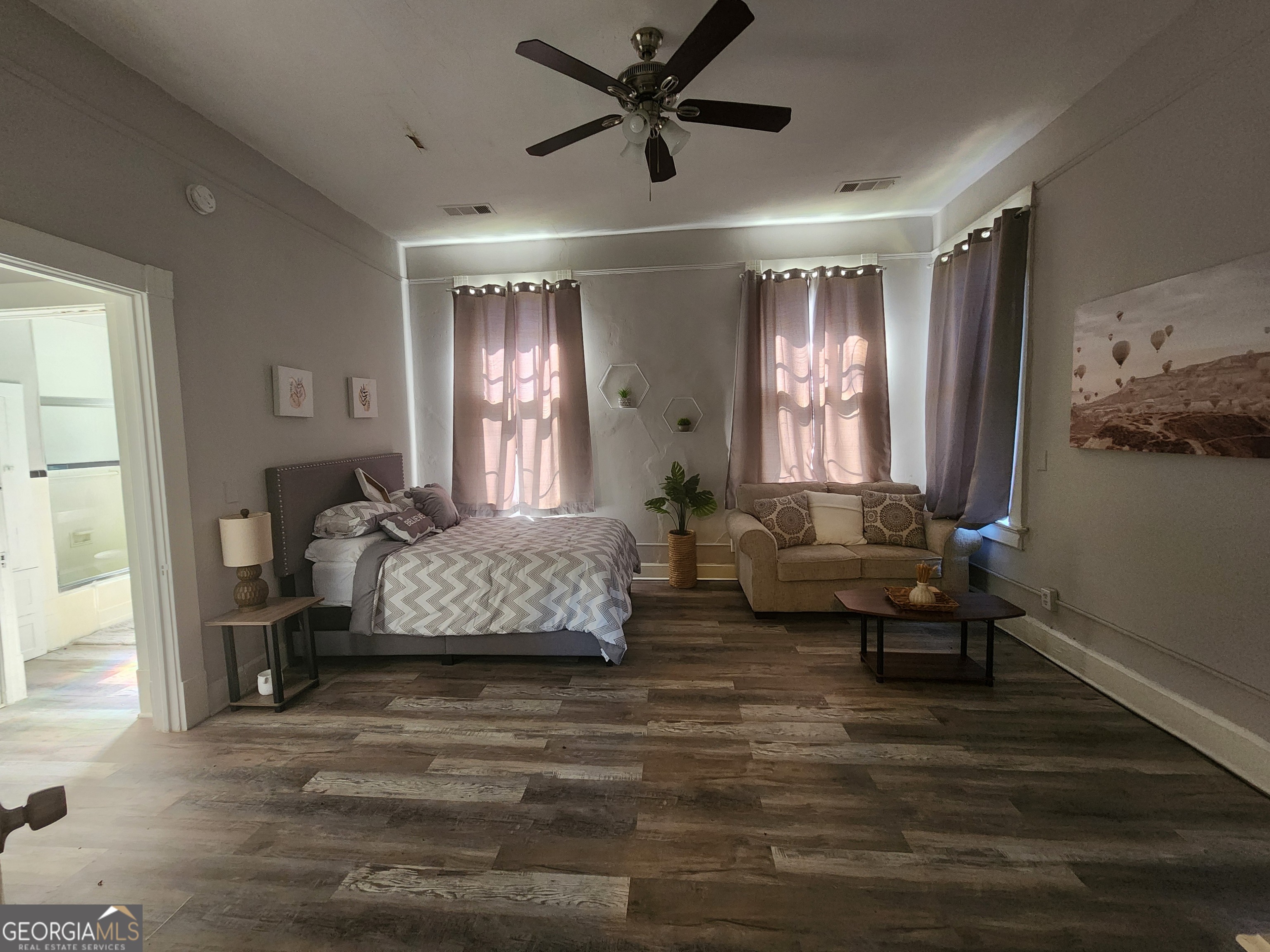 917 Oakview Avenue, Unit 5 Columbus, GA 31906 - Photo 8 of 15 a living room with furniture and a large window