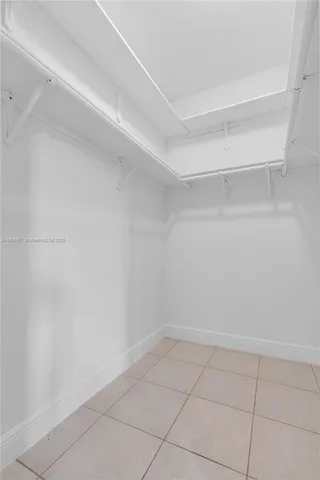 a view of an empty walk in closet