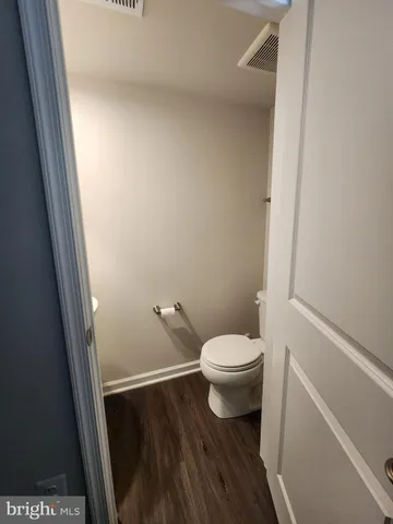 a bathroom with a toilet and a sink