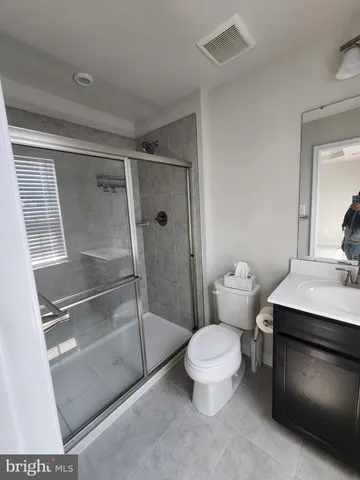a bathroom with a toilet and a sink