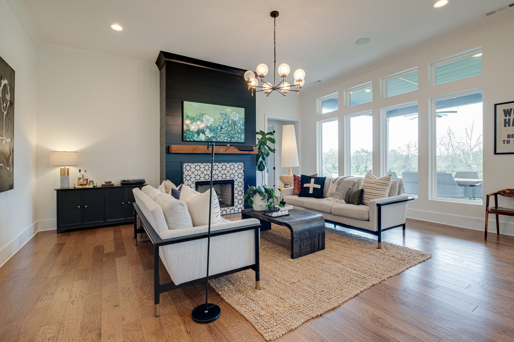 3010 Ranch Rd Mount Mount Juliet, TN 37122 - Photo 11 of 51 a living room with furniture a fireplace and a chandelier