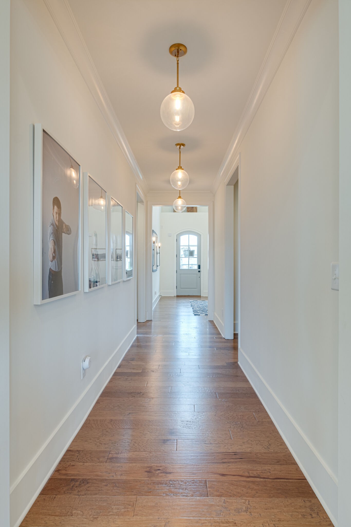 3010 Ranch Rd Mount Mount Juliet, TN 37122 - Photo 10 of 51 a view of a hallway with wooden floor and a kitchen