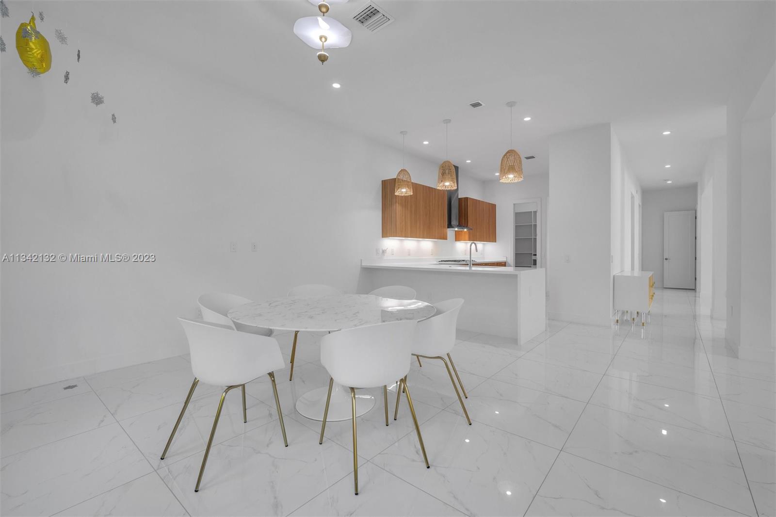 5840 Brookfield Circle Hollywood, FL 33312 - Photo 12 of 45 a view of a dining room with furniture