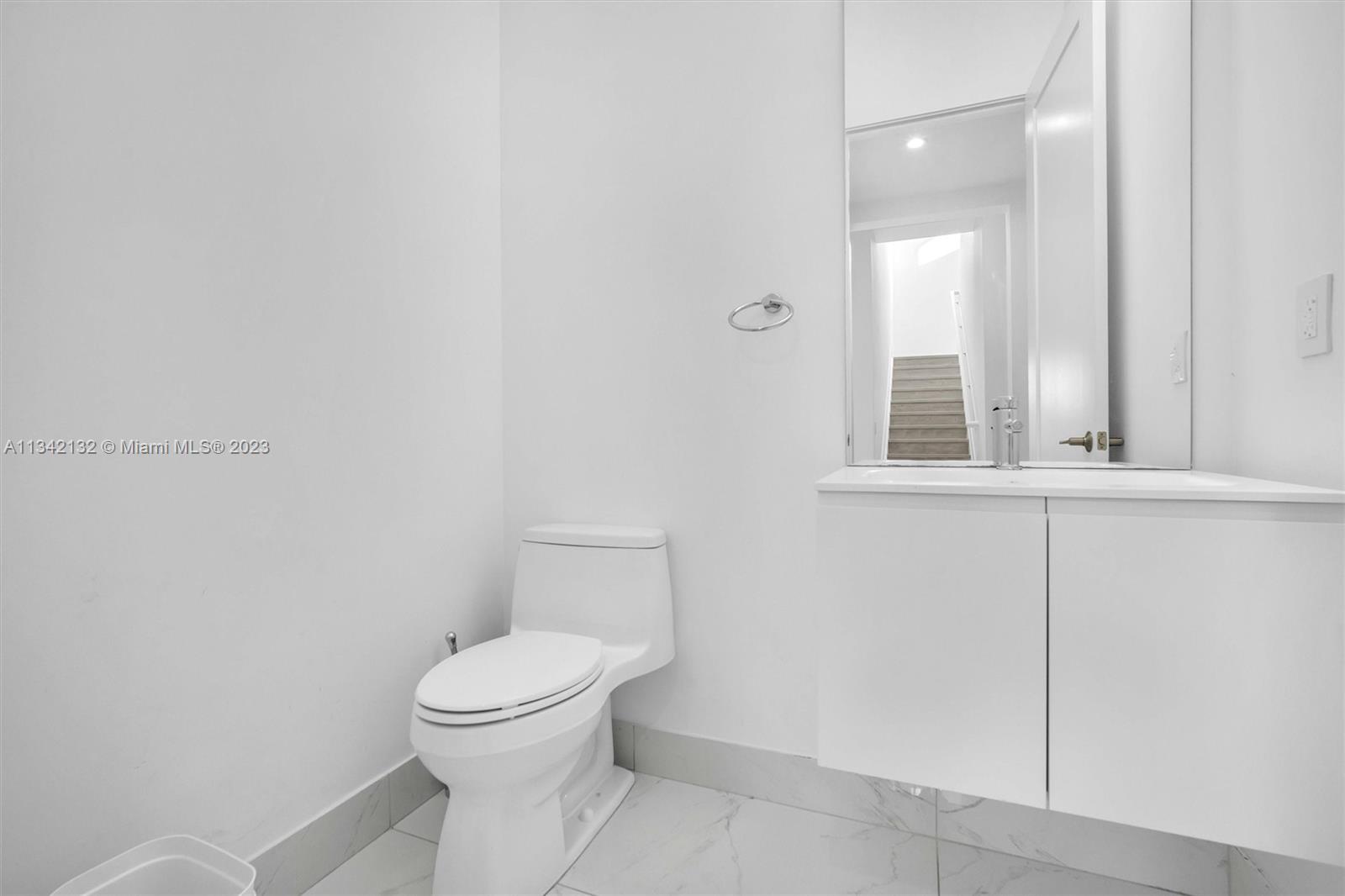 5840 Brookfield Circle Hollywood, FL 33312 - Photo 25 of 45 a bathroom with a toilet and a sink