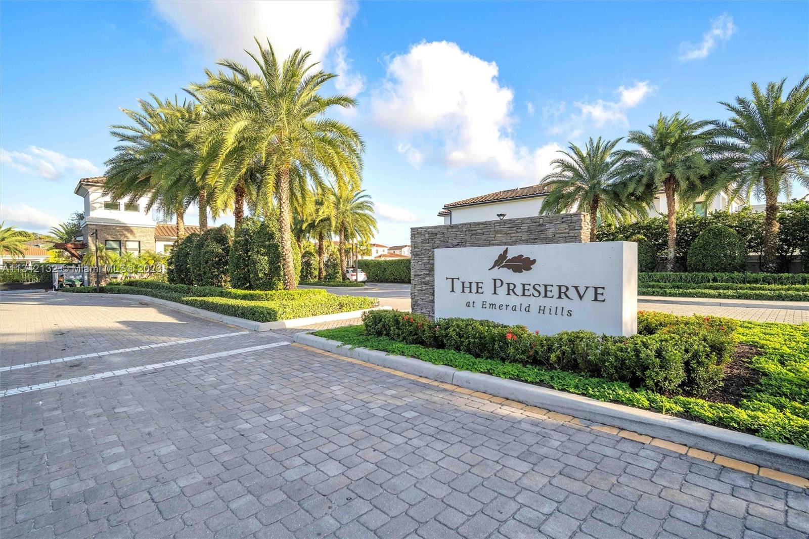 5840 Brookfield Circle Hollywood, FL 33312 - Photo 40 of 45 a sign board with palm trees
