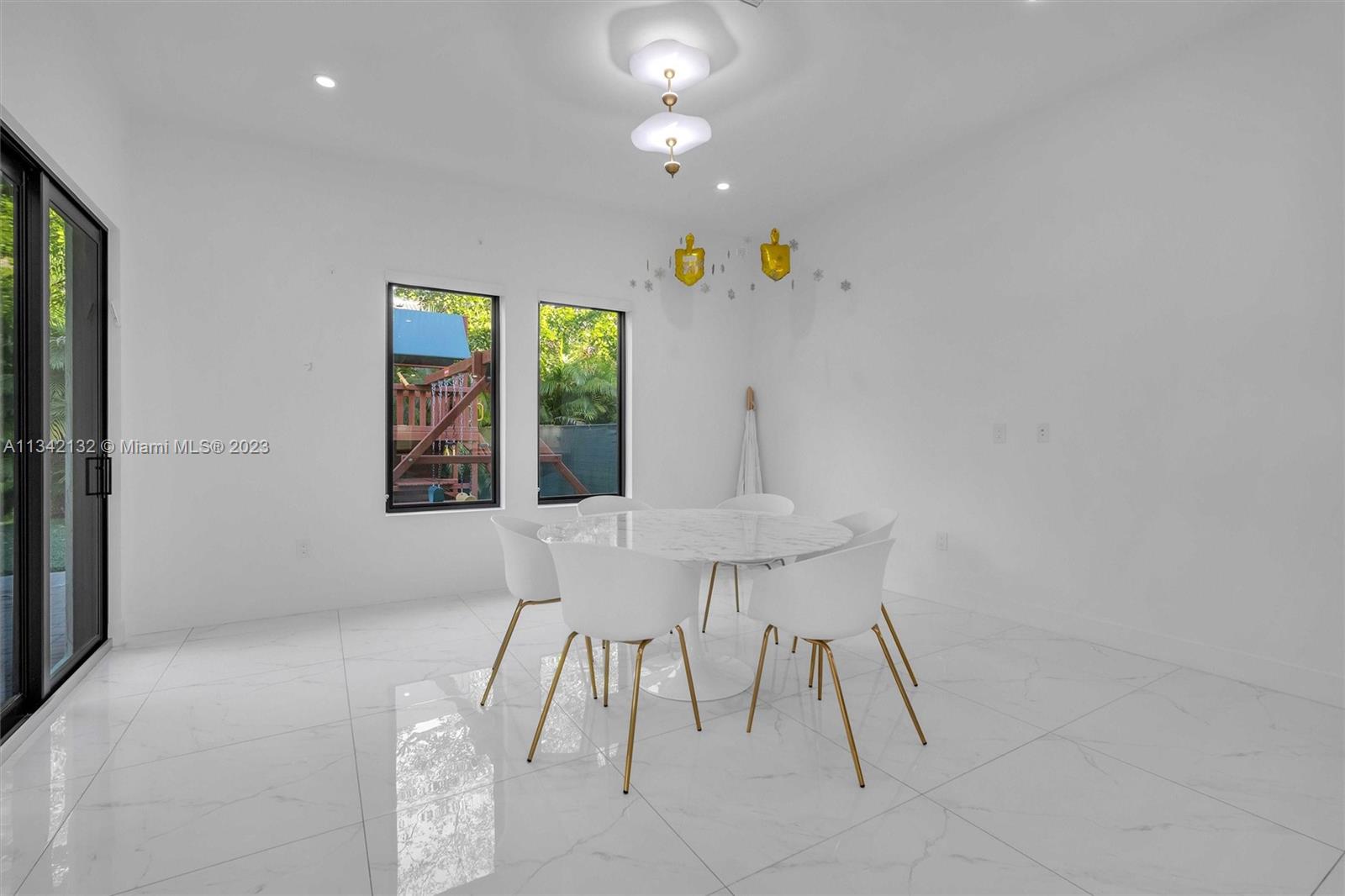 5840 Brookfield Circle Hollywood, FL 33312 - Photo 10 of 45 a view of an empty room with a window