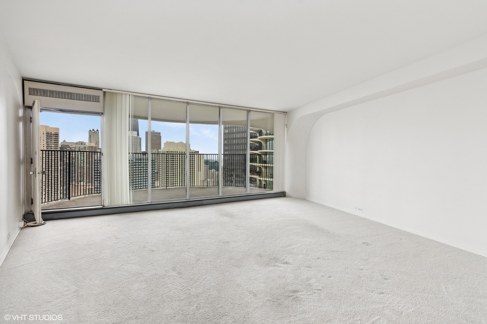 300 North State Street, Unit 4606 Chicago, IL 60654 - Photo 2 of 15 a view of an empty room with a window