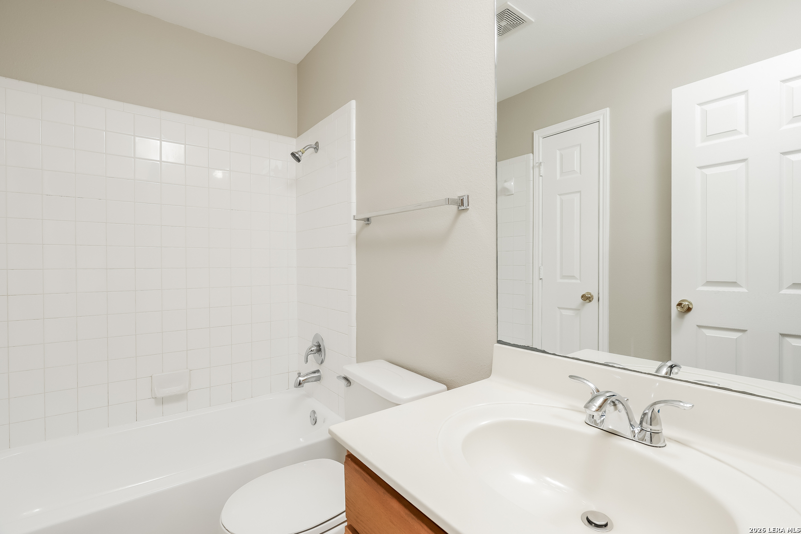 8611 Tioga Pass Helotes, TX 78023 - Photo 8 of 14 a bathroom with a sink toilet and shower