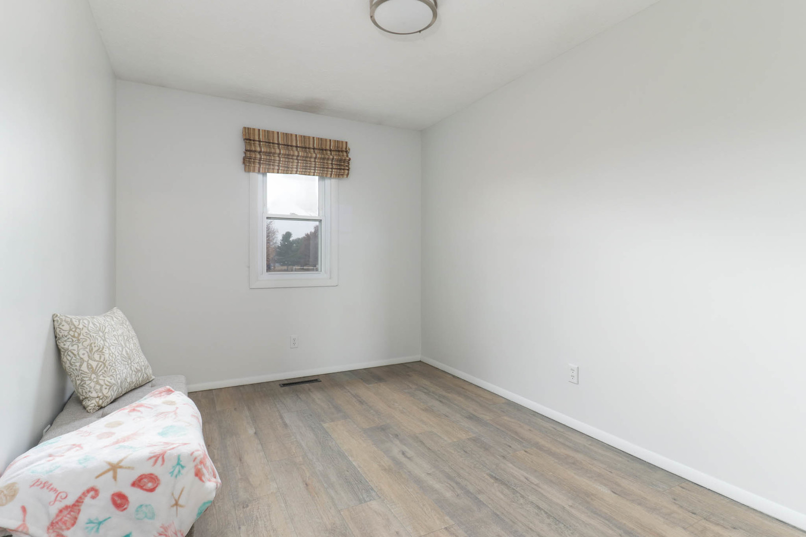 1550 Hunt Drive, Unit C Normal, IL 61761 - Photo 12 of 21 a bedroom with a bed and window