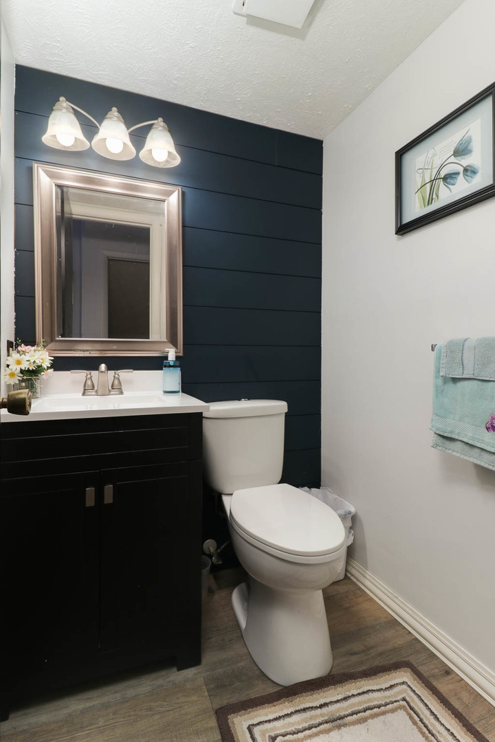 1550 Hunt Drive, Unit C Normal, IL 61761 - Photo 8 of 21 a bathroom with a sink and a toilet