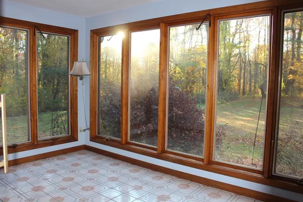 a view of an empty room and window