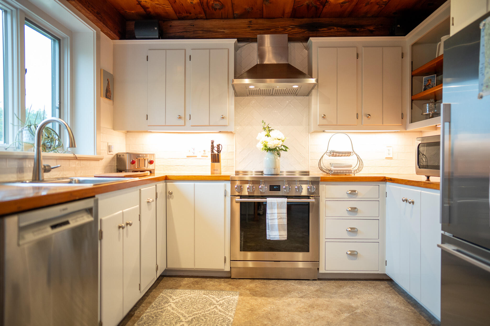 625 Bridge Road Eastham, MA 02642 - Photo 19 of 104 a kitchen with a stove and a refrigerator