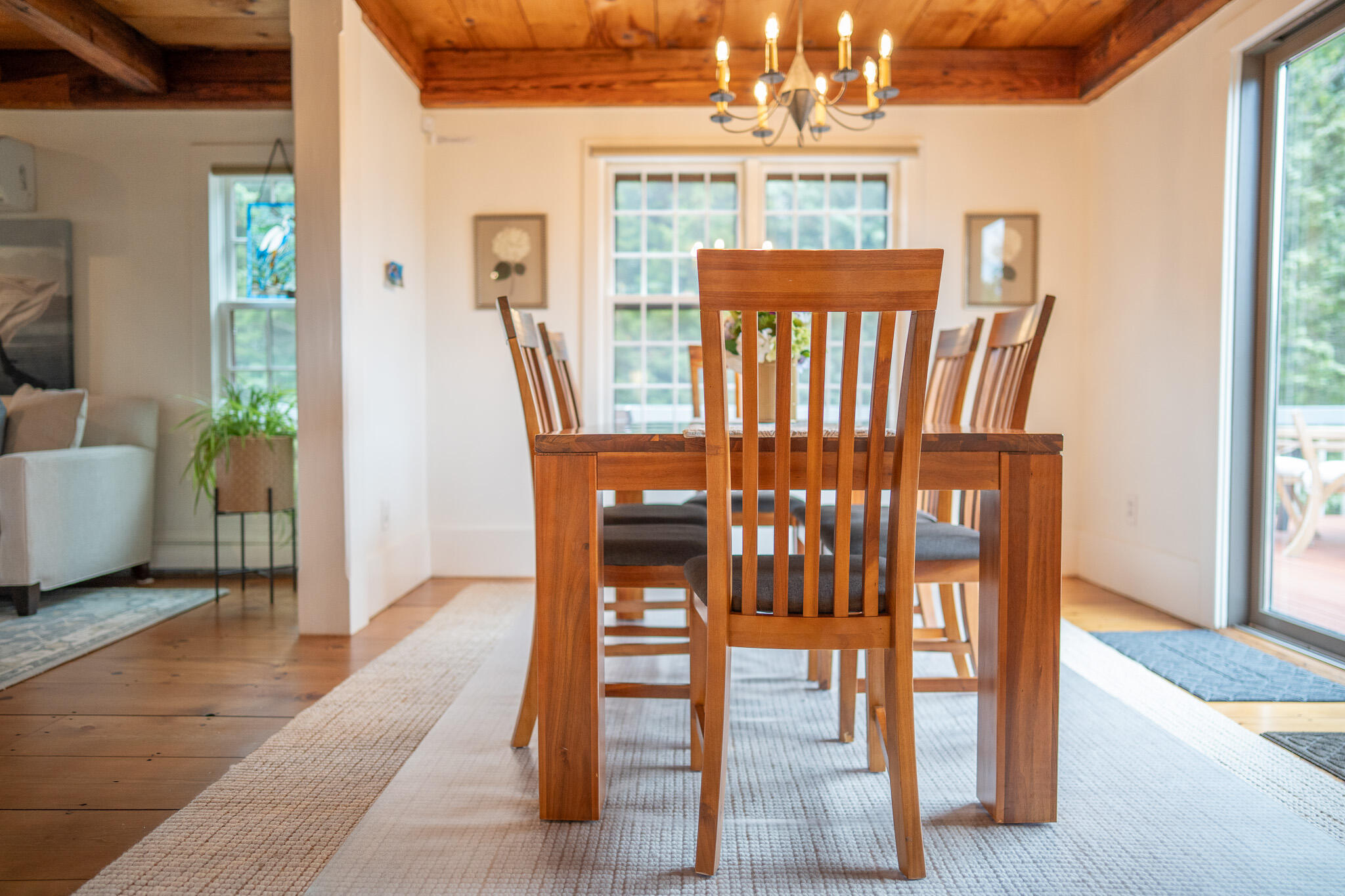 625 Bridge Road Eastham, MA 02642 - Photo 21 of 104 a view of a dining room with furniture window and wooden floor