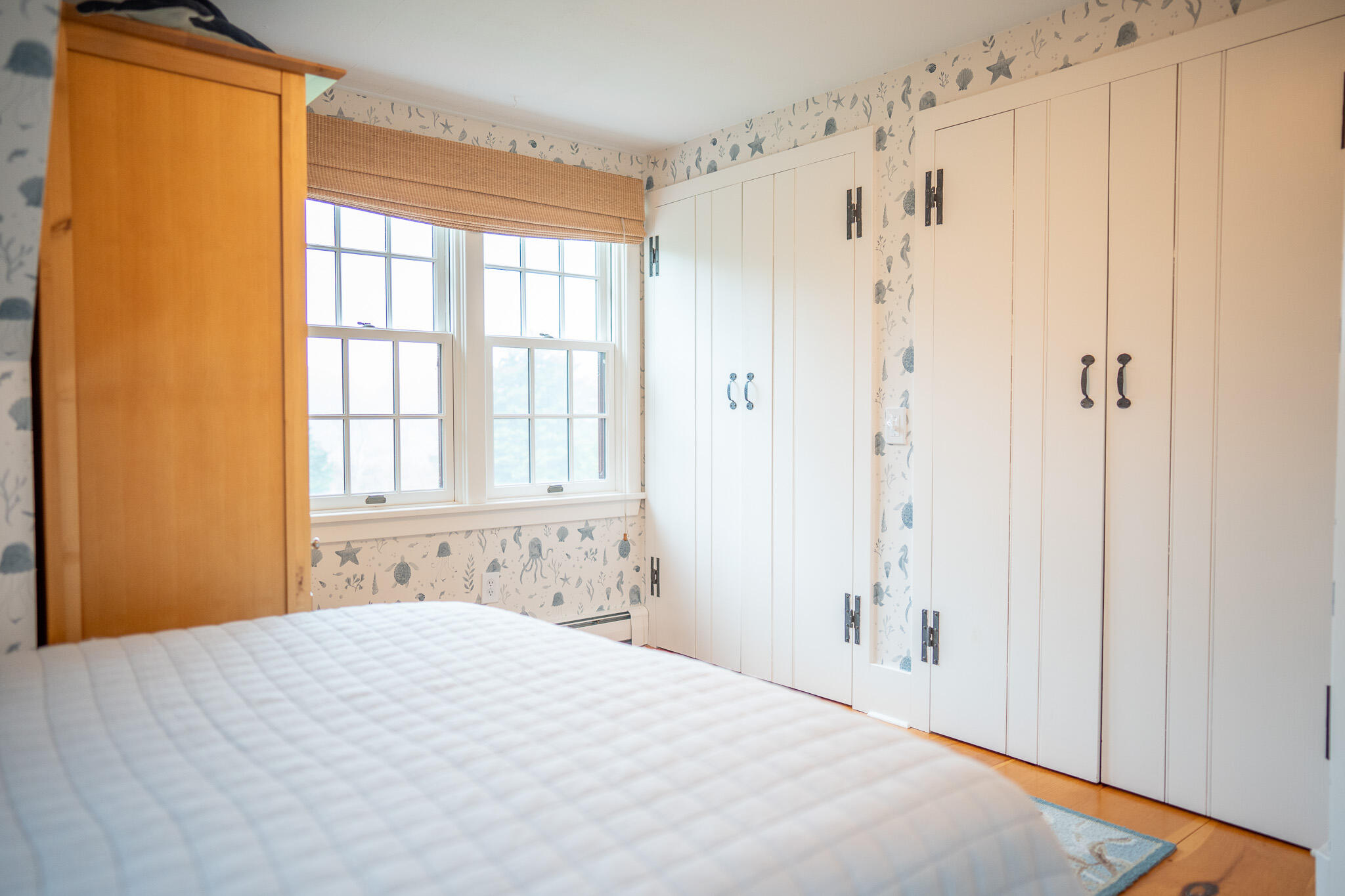 625 Bridge Road Eastham, MA 02642 - Photo 49 of 104 a bedroom with a bed and a window