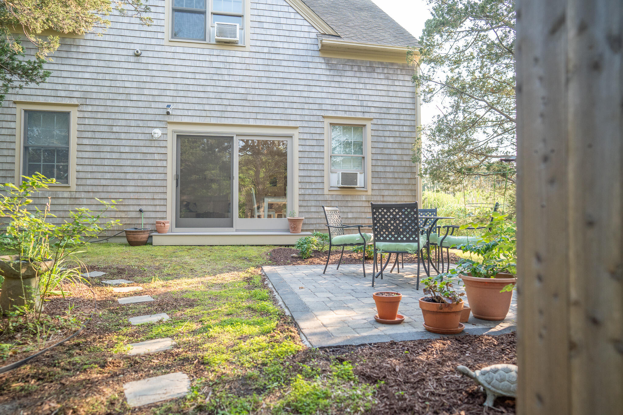 625 Bridge Road Eastham, MA 02642 - Photo 80 of 104 a view of a house with backyard and sitting area