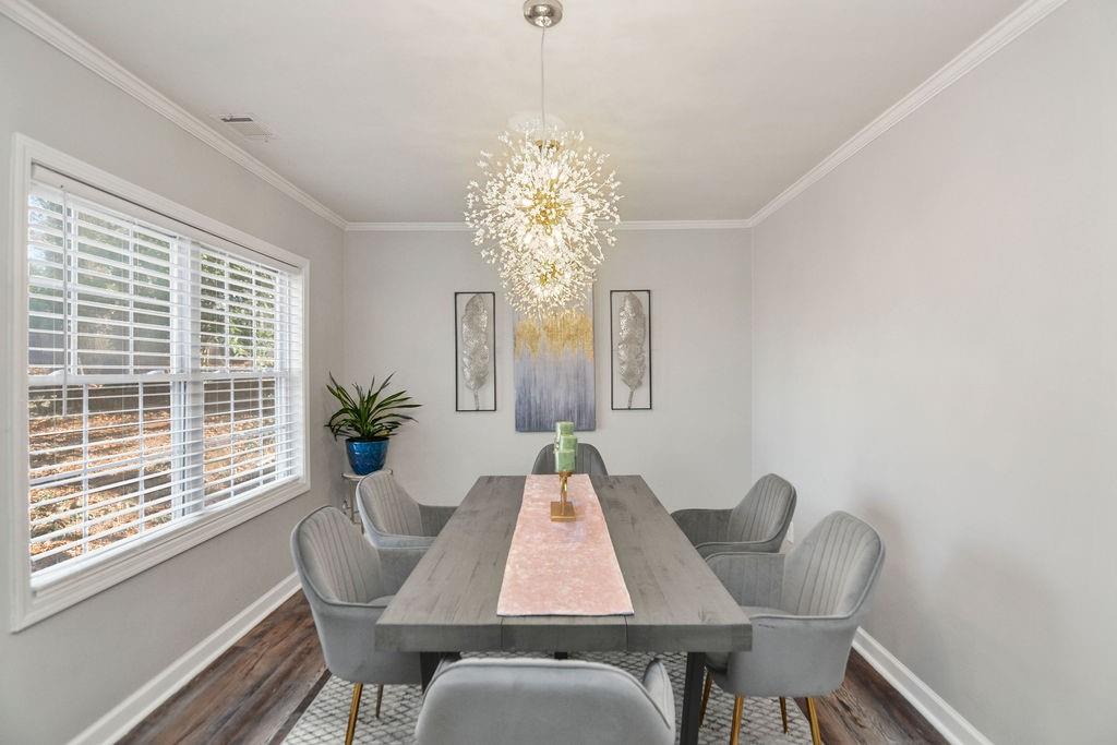 1917 Spring Avenue Atlanta, GA 30344 - Photo 7 of 22 a dining room with furniture and window