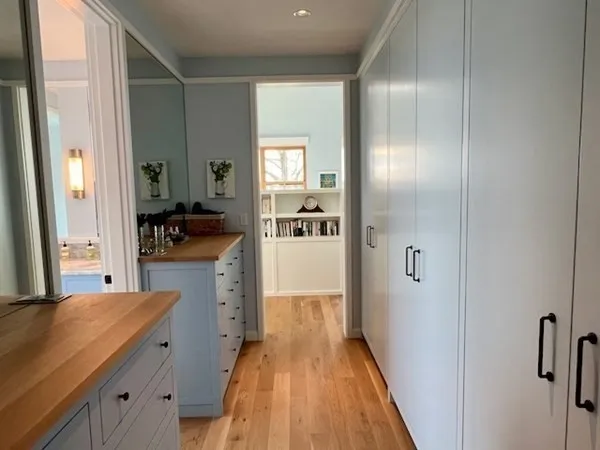 a kitchen with a refrigerator and sink