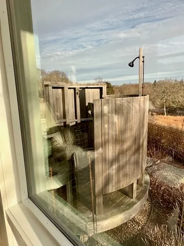 a water heater sitting next to a window