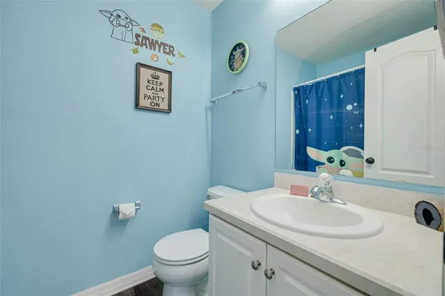 a bathroom with a sink and a toilet