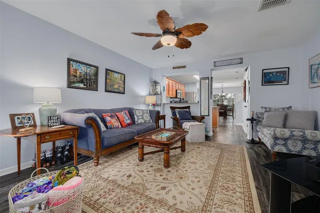 a living room with furniture and a rug