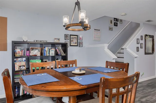 a view of a dining room with furniture