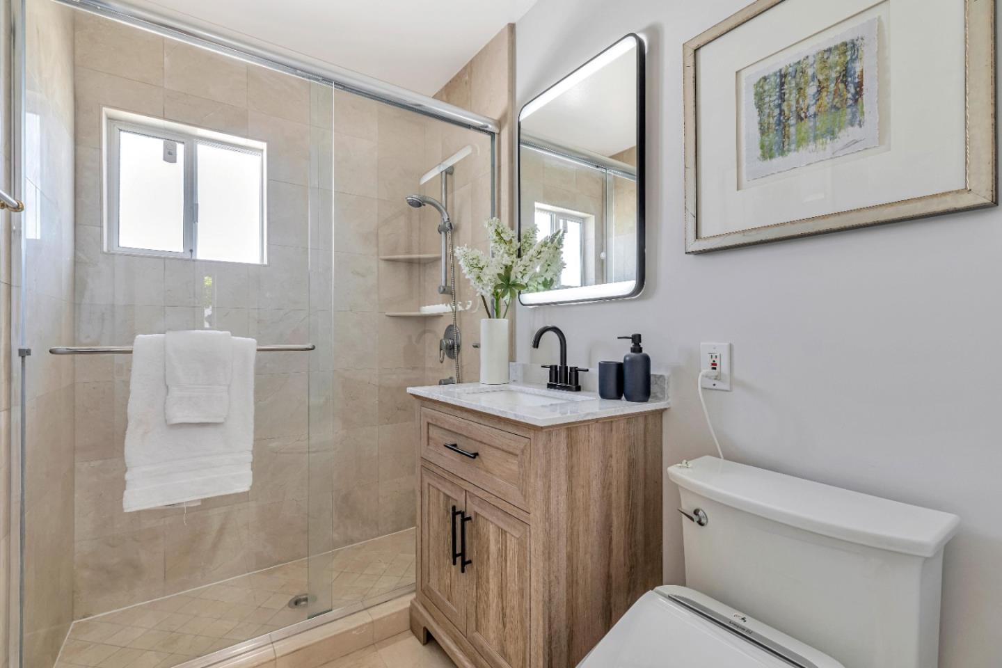 152 Brian Lane Santa Clara, CA 95051 - Photo 22 of 76 a bathroom with a toilet sink and mirror