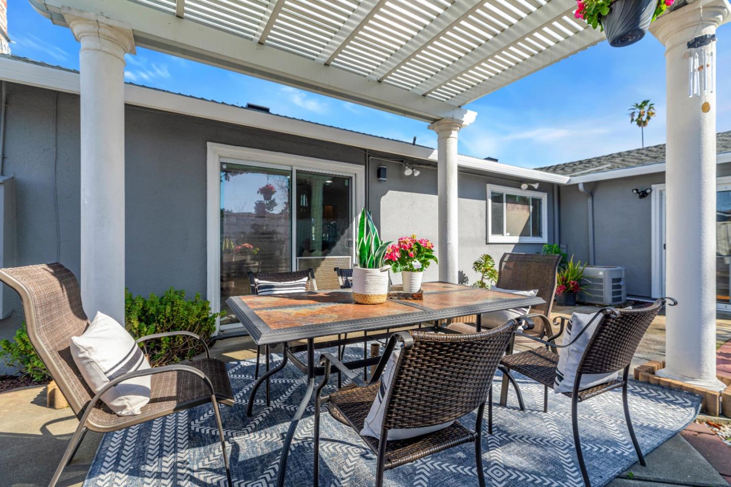 152 Brian Lane Santa Clara, CA 95051 - Photo 31 of 76 a view of an outdoor dining space with a table and chairs