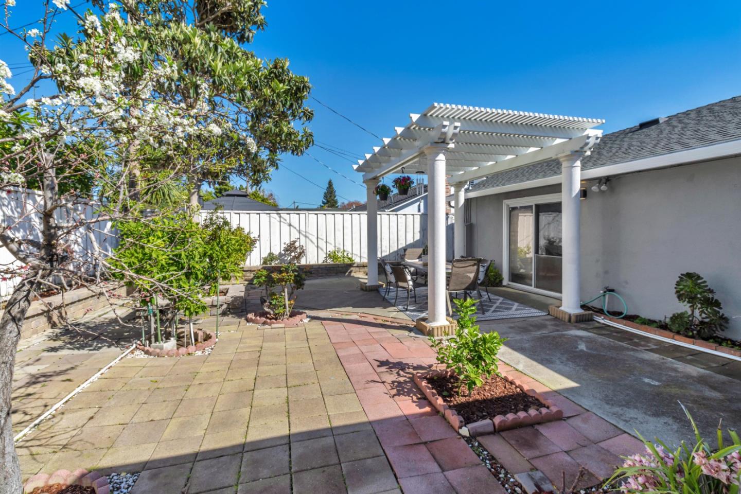 152 Brian Lane Santa Clara, CA 95051 - Photo 32 of 76 a view of a chairs and table in a patio