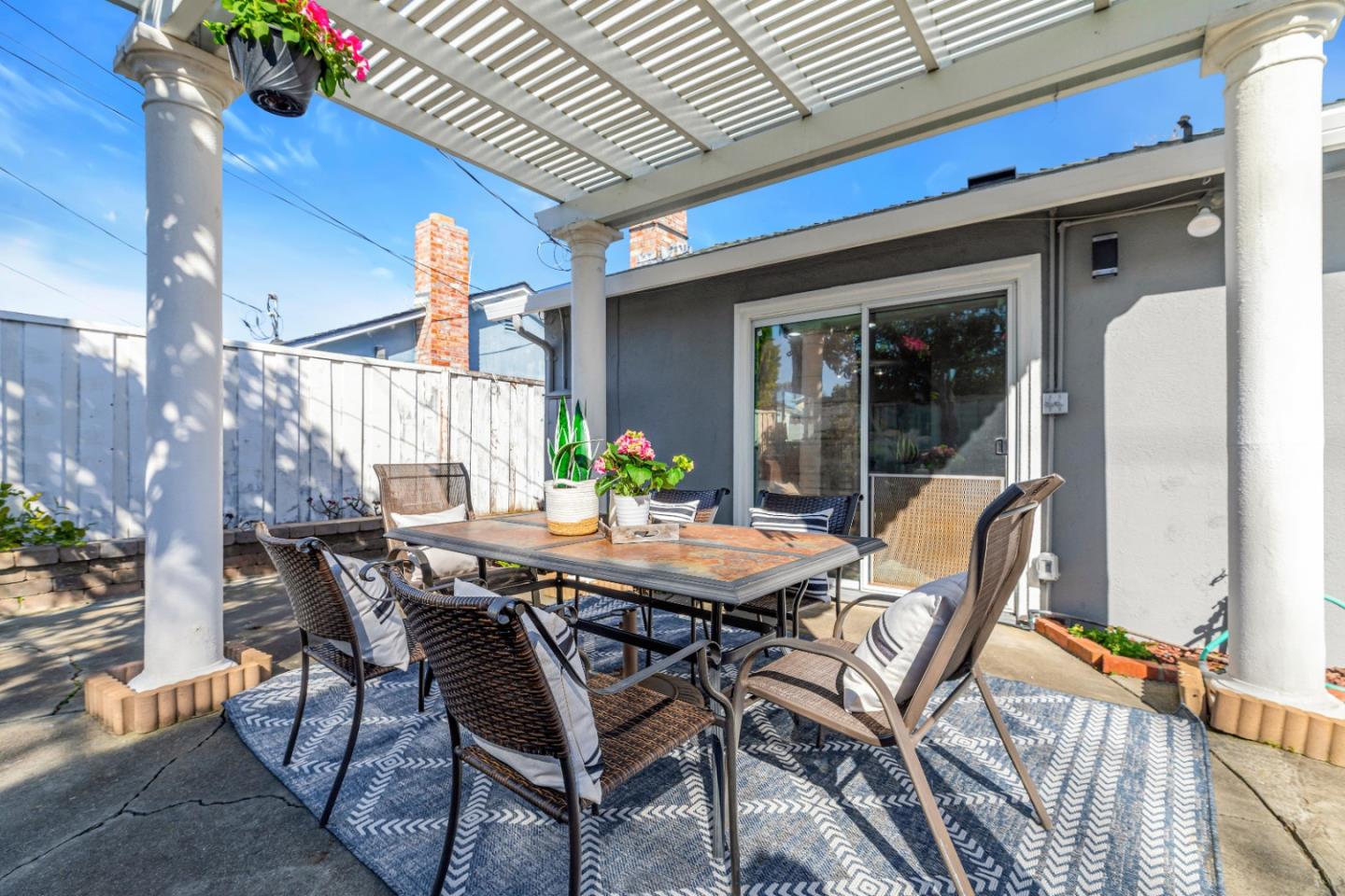 152 Brian Lane Santa Clara, CA 95051 - Photo 61 of 76 a view of an outdoor dining space with a table and chairs