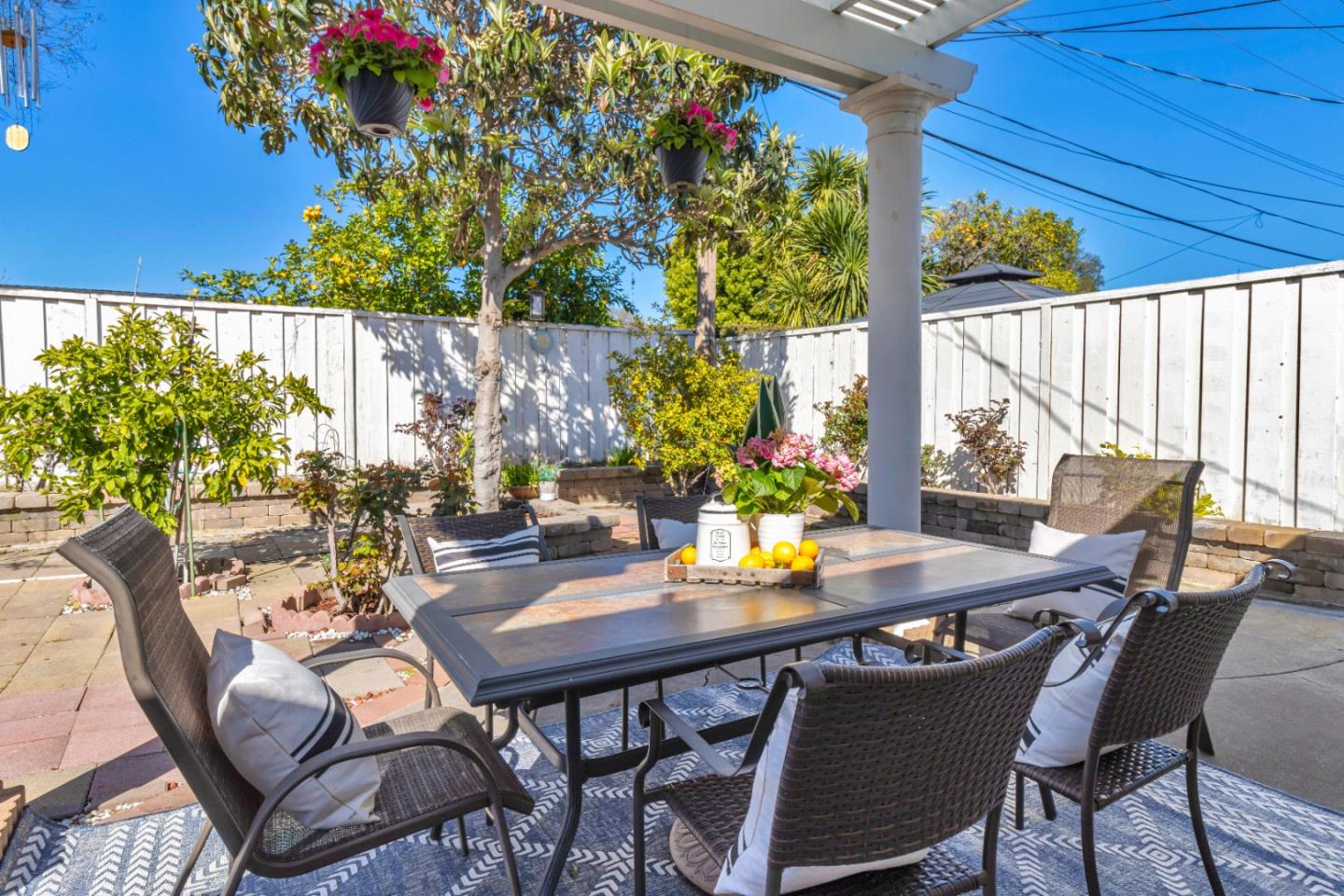 152 Brian Lane Santa Clara, CA 95051 - Photo 66 of 76 a view of a dining table and chairs in patio