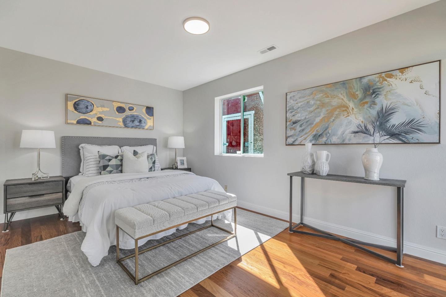 152 Brian Lane Santa Clara, CA 95051 - Photo 70 of 76 a bedroom with a bed and a painting on the wall