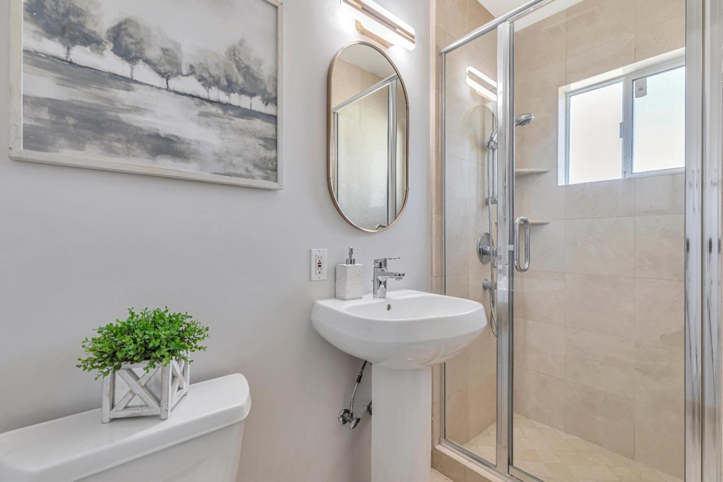 152 Brian Lane Santa Clara, CA 95051 - Photo 8 of 76 a bathroom with a sink a mirror and a shower