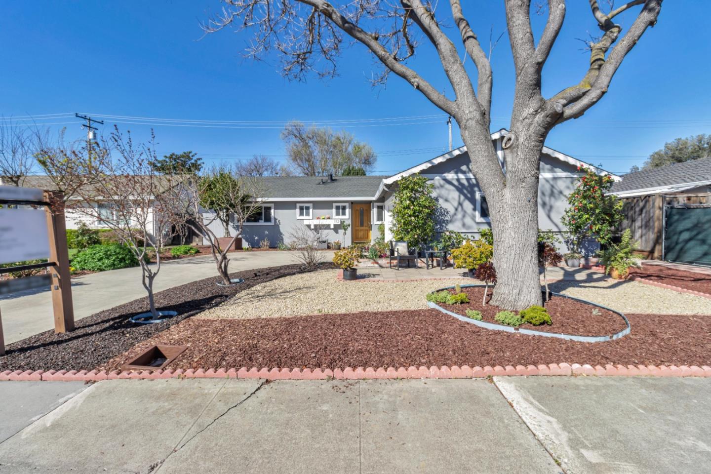 152 Brian Lane Santa Clara, CA 95051 - Photo 10 of 76 a view of a street with a building in the background