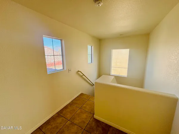 a view of a room with windows